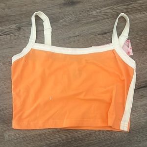 Orange tank w/ white lining